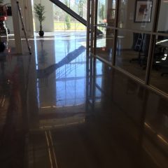 Micro Matic mechanically polished concrete floors by Concrete Polishing, Inc. in new office expansion.
